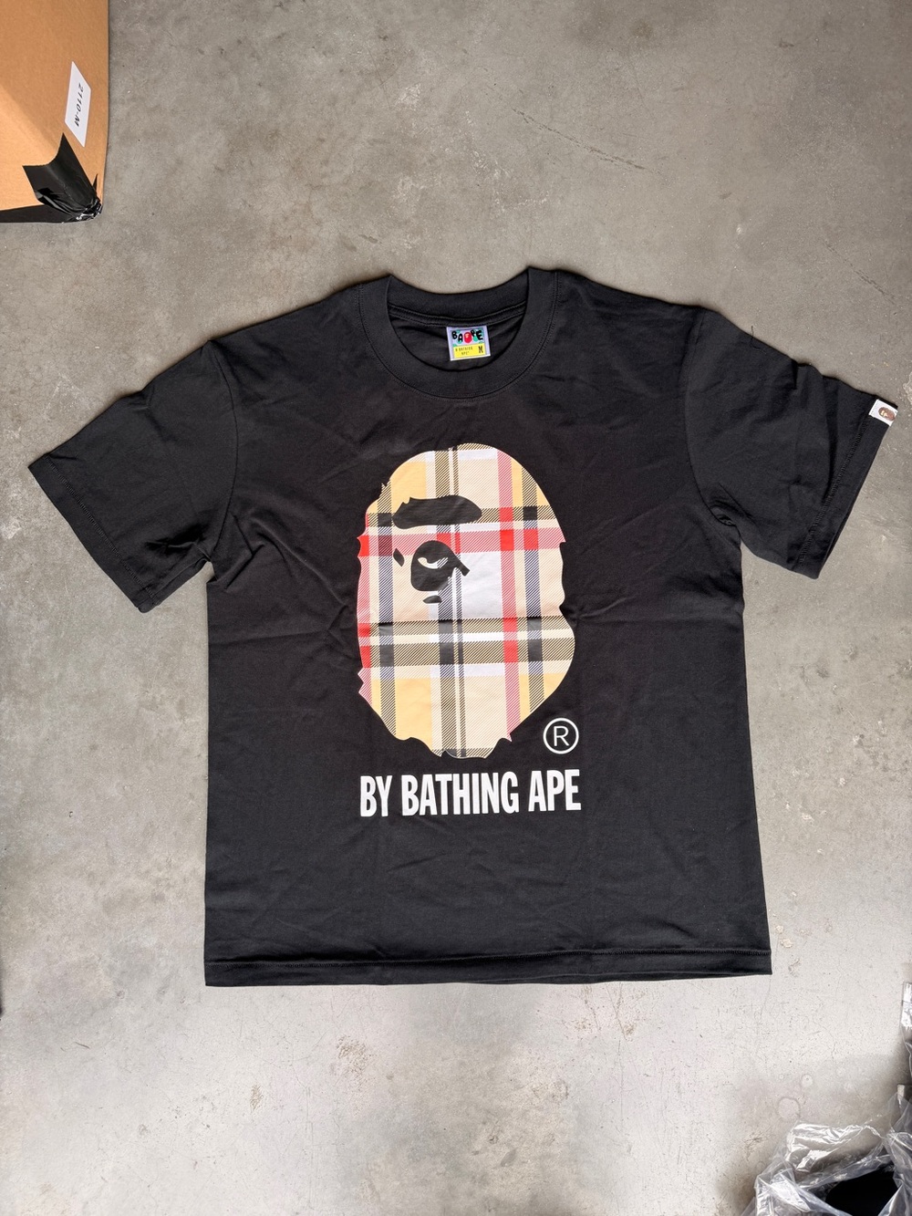 Bape Black Tee with Beige Plaid Ape Head Graphic